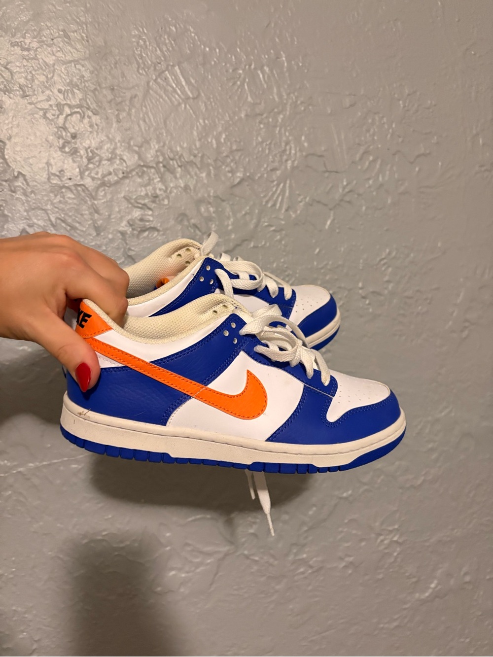 Nike Blue and White Sneakers with Orange Swoosh